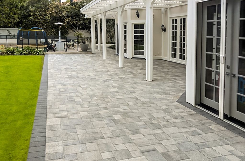 Stamped Concrete or Pavers – Which is the Best Option for Your Outdoor Living Space?