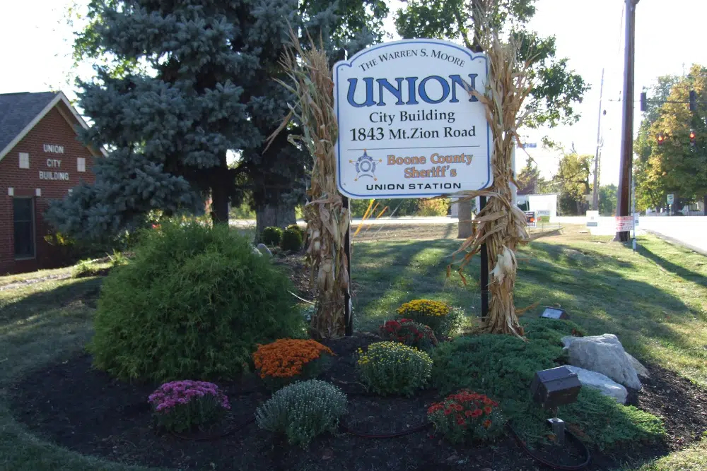 Union-ky | Davis Landscape Design & Installation Sign for Union City Building at 1843 Mt. Zion Road, flanked by corn stalks with a flower bed in front